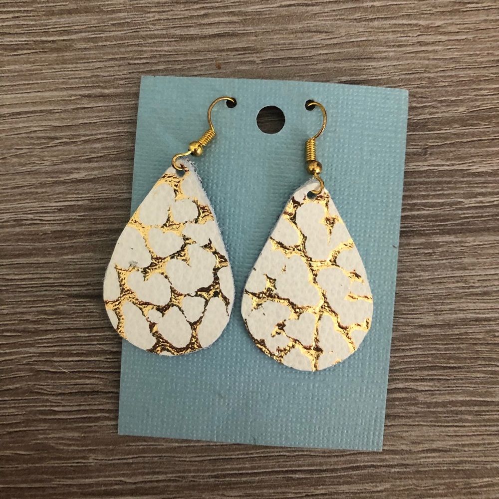 Gold and white leather earrings